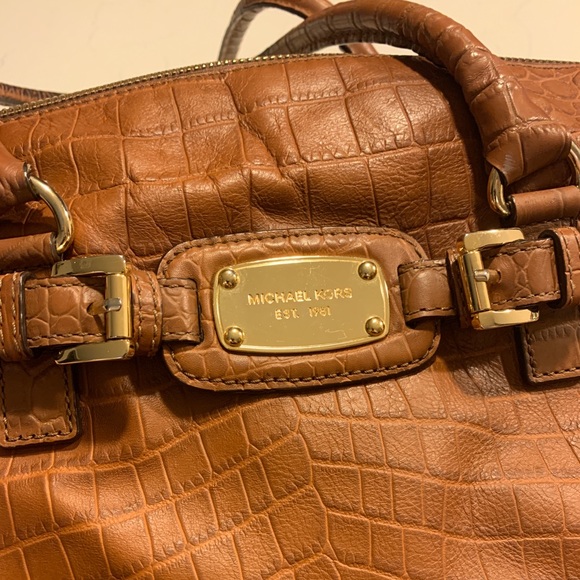 Michael Kors handbag; Luggage colored/crocodile embossed...